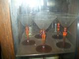 Amber stemmed martini glasses
