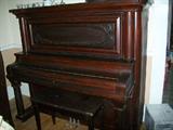 Early ornate 1800's upright grand piano in a gorgeous finish with bench