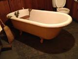 cast iron Claw Foot Tub with Oak Seat. May be sold seperately