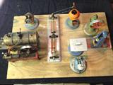 1930's? Steam Engine Toy set. All hooked up and driven by the Antique Steam engine. Believed to be in working condition.