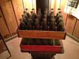 1 Case of old sealed and full Coke bottles
1 Case of empties