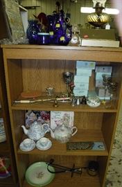 candles, teapots, blue glass, perfume bottles