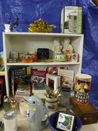 cookbooks. Art glss rooster. Ornamental grape cluster. Dolfin sound cookie jar - works