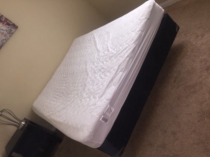 bed measures  a full XL, almost Queen
