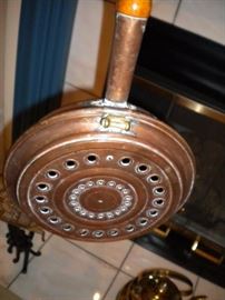 Primitive copper bed warmer