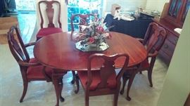 Formal dining room with 6 chairs, two leaves