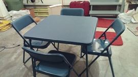 Just in time for the holiday guest fold up table and four chairs