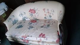 Love seat in bedroom