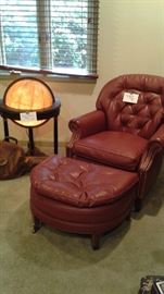 Leather chair & ottoman. Vintage lighted Repogle globe on stand ...sold globe
