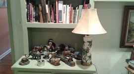 Collection of iron coin banks.