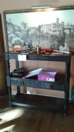 Heavily carved 2 tier rectangular table. Paris picture.