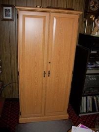 tall two door locked cabinet