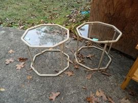 Two matching glass top tables