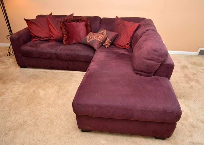 Purple 2 Piece Sectional Sofa (Smaller section measures 53" long, longer section measures 80" long, Both are 37" deep and 30" high at the back, 16" high at the seat. Good Condition)