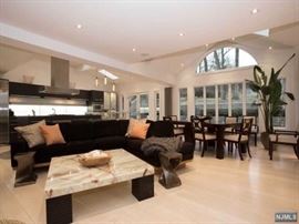 Thayer Coggin black velour sectional sofa, fabulous thick onyx top square cocktail table 52" square,one of a pair of stands carved out of single block of wood