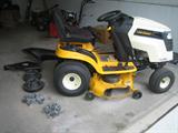 Cub Cadet riding lawnmower with loads of extras, 1 year old.