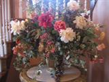 Large silk flower arrangement.