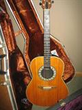 Ovation 6 string acoustic guitar with case.