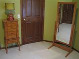 Tall beveled cheval mirror in oak stand. Wood Jewelry Cabinet.