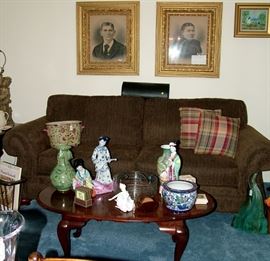 Asian Decorative and Collectible items including figurines, vases, floor vases, boxes and many other items. High end coffee table and end tables, Brand new Sleeper Sofa in Espresso, Huge Antique Frames for framing your own photos or adding a mirror or enjoying the victorian photos contained in them just the way they are.....