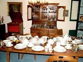 Several China Sets - all high end.  A beautiful wood traditional table, chairs and china hutch, a corner cabinet, miniature oil paintings, silver servingware, crystal, stemware, tons of the avon hummingbird crystal pattern and so much more!