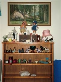 Dolls, Figurines, Candles, paintings, and this handmade solid wood bookshelf is  a must see if you need a sturdy bookshelf!  It is BEAUTIFUL!