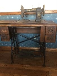 Antique sewing machine with table 