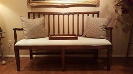 Spindle back settee bench with carved legs
