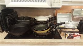 Pots and pans, cake pans, strainers, muffin pans, cookie sheets