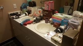 Bathroom items, cosmetics, tanning supplies, hot water bladders