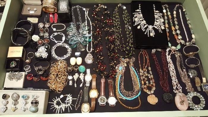 Jewelry including real gemstones, gold, silver, Scaasi necklaces, Graziano necklaces, Victoria Wieck watch, Heidi Daus ring, Badgley Mischka ring, Monies cow bone earrings, Barse sterling turquoise ring, and more