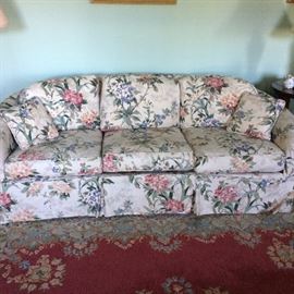 This is a beautiful curved-back sofa