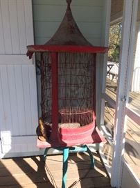 This bird cage was purchased in Fairhope, AL  it is two pieces and cement - but not too heavy