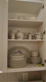 Lots of kitchen items!  Nice set of dishes!
