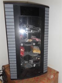 Display Cabinet with Collectible Cars and Trucks inside