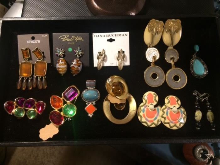 Various earrings and pins