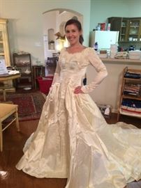 Erin in this beautiful vintage wedding grown size 4 