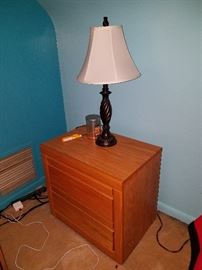 Matching nightstand and lamp.