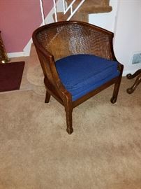 Cane-back armchair.