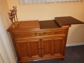 Sideboard with fold-out top