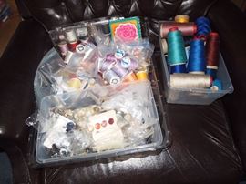 Several bins of sewing supplies, buttons, thread, fabric, notions and more!