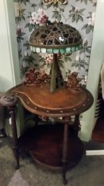 Beautiful arts & crafts one piece solid brass stained glass lamp.  C. 1870's parlor table.