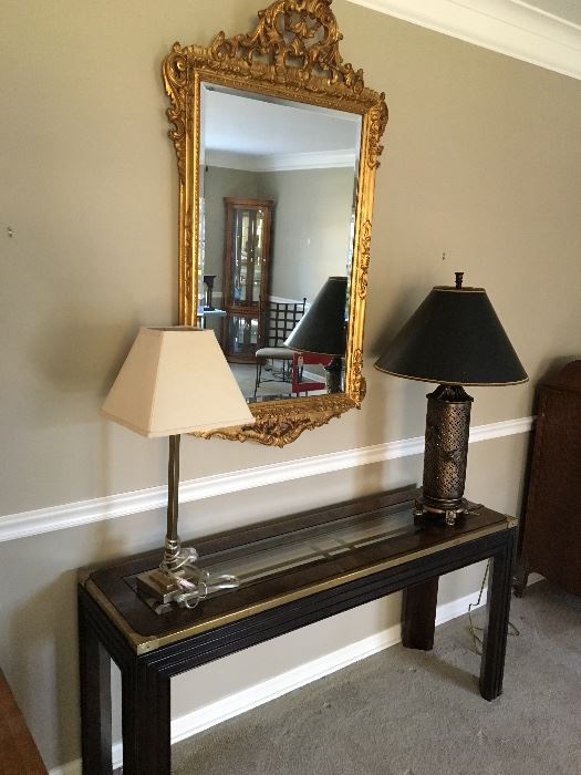 French gilt mirror, lamps, sofa, wall table