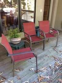 Red mesh and metal outdoor chairs