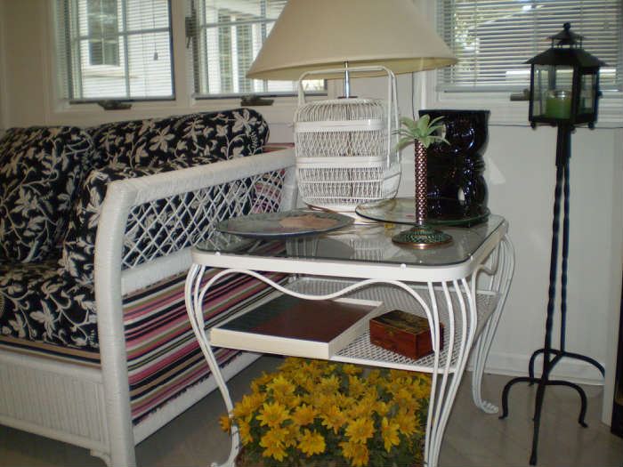 pair of metal side tables and wicker lamps