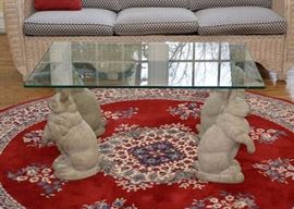 Cocktail / Coffee Table with 4 Concrete Rabbits as the Base & Glass Top