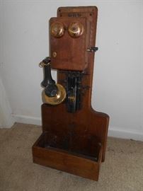WALNUT CASE WALL PHONE. IT IS A NICE AS ANY YOU WILL FIND!