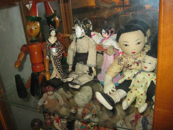wooden pinocchio and Asian dolls, owner was a world traveler toured the orient in 1963 