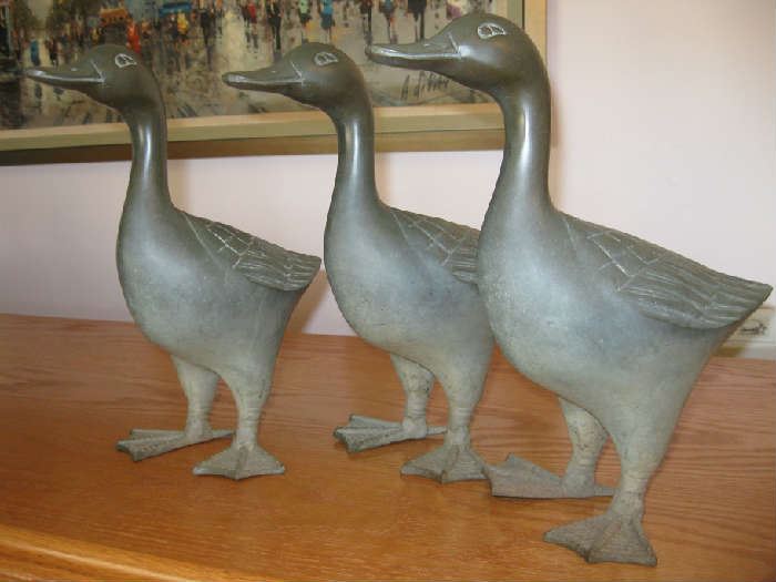 3 brass ducks