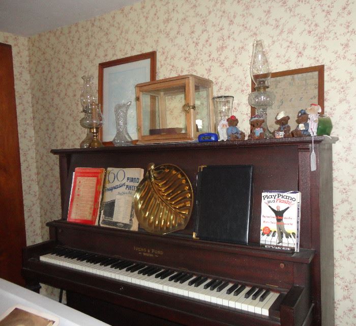Ivers and Pon piano, display case, teddy bears and oil lamps .... and sheet music.
